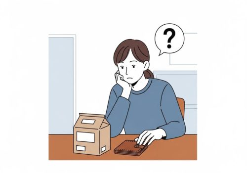 届いた商品の価格について考える女性