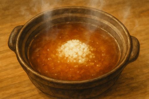 あんこう鍋の〆で、雑炊を作っているシーン