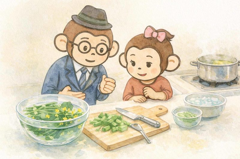 おサルの家族がアスパラ菜の下処理をしているシーン